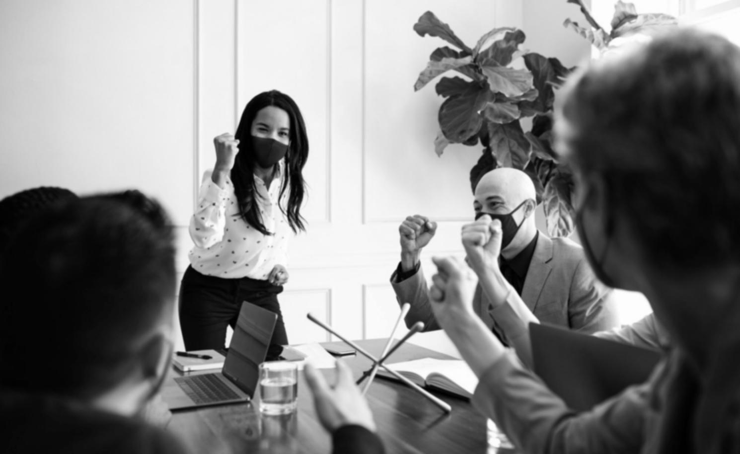 Collaborative learning environment with students working together on financial planning exercises